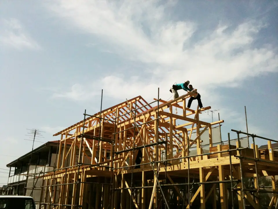 Carpenters framing a wood structure